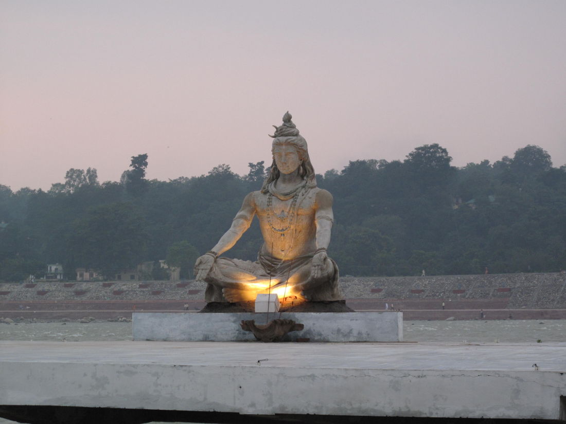 Krishna statue on the banks of the river Ganges