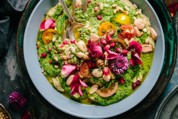 Bowl of colourful winter hummus